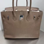 Tasche Hermes Paris vor der Restaurierung